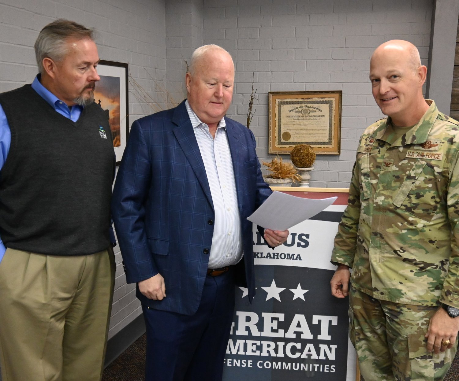 Civilian and military leaders excited about the news that Altus is on the short-list for an award of excellence: left, Rodger Kerr, President and CEO of the Altus Chamber of Commerce; Dr. Joe Leverett, chairman of the Military Affairs Committee; and Col Blaine L. Baker, Commander of Altus Air Force Base.