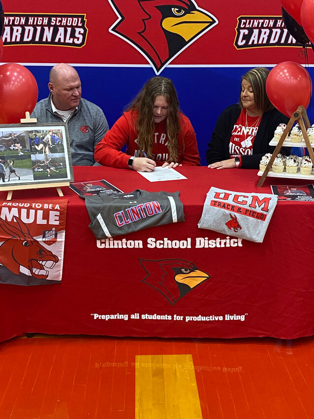 THE LADY CARDINALS Briley Wishard recently signed her letter of intent to attend the University of Central Missouri to join the Jennies track and field program. Wishard was joined by friends and family, including her parents, Brian and Angela, to celebrate her signing. 