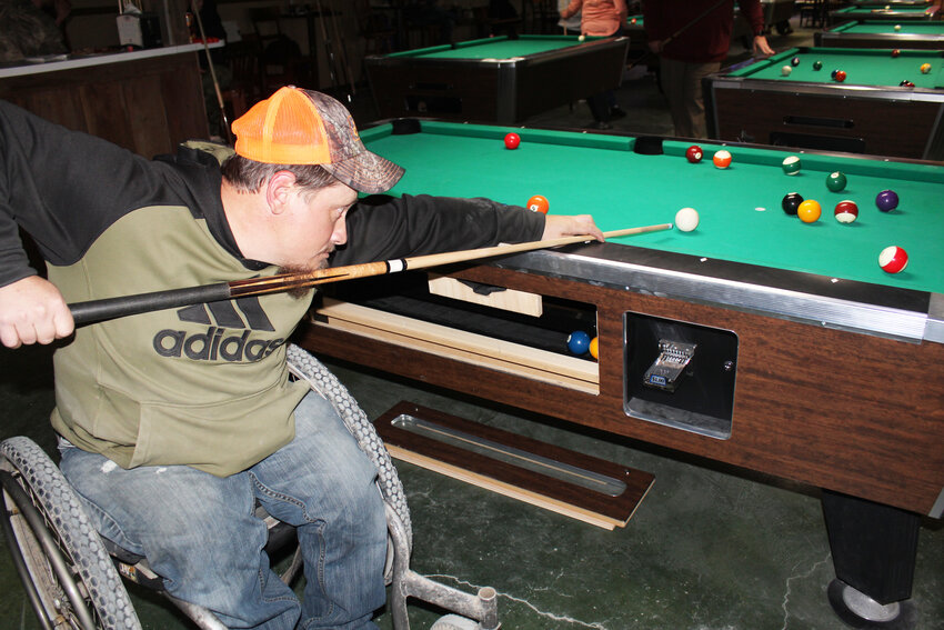 TAKING PART IN A WINNING WEEKEND, Nathan Taylor helped his Sedalia team take the championship during a tournament at Elite Billiards, winning $1,600.