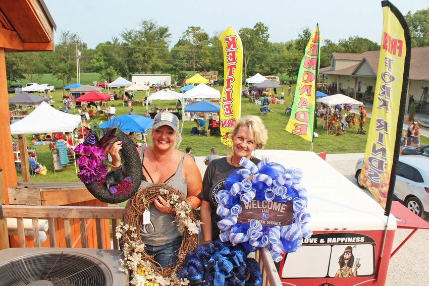 THOUSANDS are expected to attend Junk Fest this Saturday in Clinton. Past attendees include wreath crafters Lea Nickel and Michelle Welsh.
