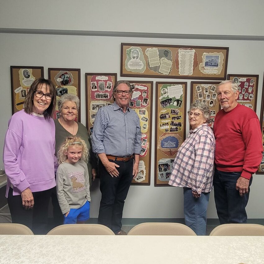 AN ANGELIC ANNIVERSARY, Warsaw's First United Methodist Church celebrates 175 years in 2025. Founded in 1850, the congregation is one of the longest standing church organizations in the community. Looking back through the years were church members (L to R): Kim Nichols, with granddaughter Adaline Rowles; Shawn Miller, Randy Eaton, Vicki Schroder and Warren Schroder.