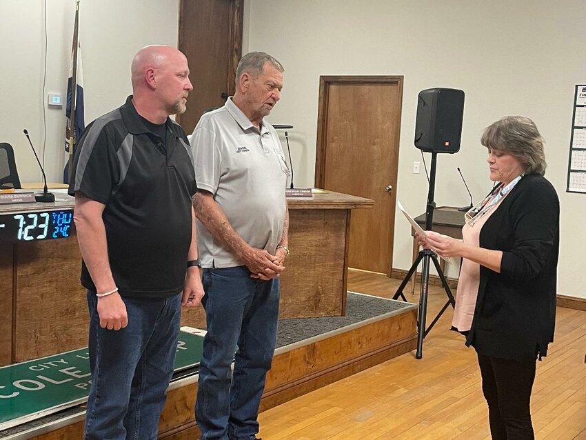 DOING THEIR CIVIC DUTY, Steve Knox and David Locke were sworn in as aldermen during the Cole Camp City Board meeting by City Clerk Dawn Paul.