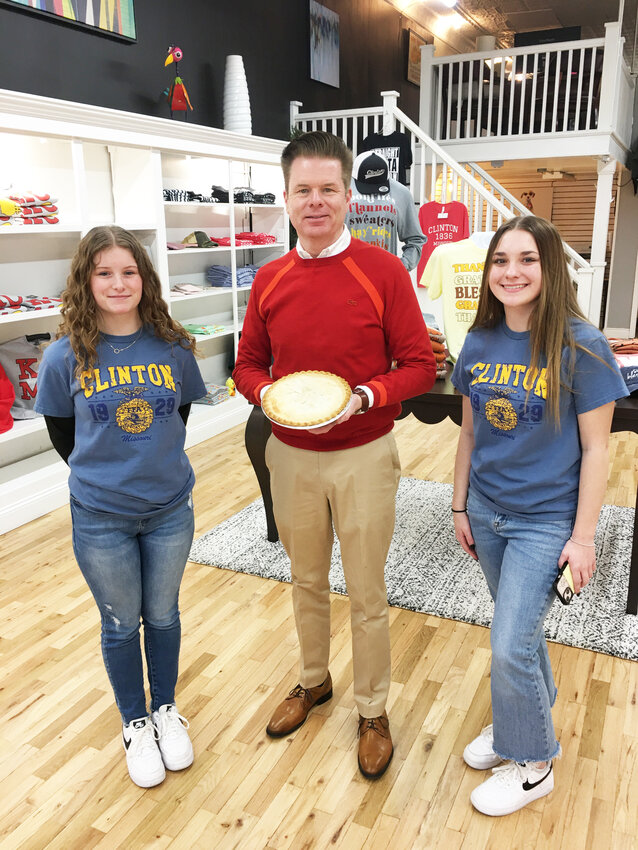 Clinton FFA members, Chloe Westendorff and Chloe Long stopped by The Clinton Daily Democrat office on Friday, February 9th, to say thank you and drop off a cherry pie in recognition of National Cherry Pie Day (Feb. 20th). Pictured with the girls is Publisher, James White.