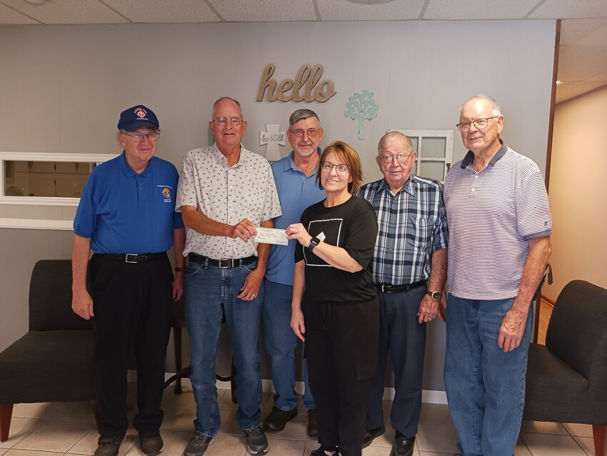 Knights of Columbus Council #1896, present Diane Kelce with a check to Door of Hope. Pictured are Mike Good, Ron Cook, Hal Barta, Daine Kelce, Maurice Gatzmeyer and Wilbur Miller.