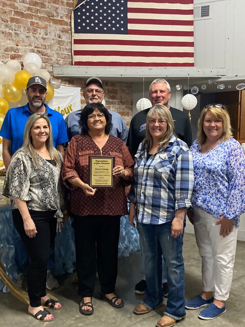 Retiree Joyce Crump,  pictured with Board Member Jake Bathgate, Contract Operator Kent Leonard, Board Member (President) Terry Salmon, District Clerk/Manager Toni Conner, Operator/Assistance Clerk Diana Richardson, Board Member Beth Holt.  Not pictured are Board Members John Roofener (Vice President) and Wendy Vernon.