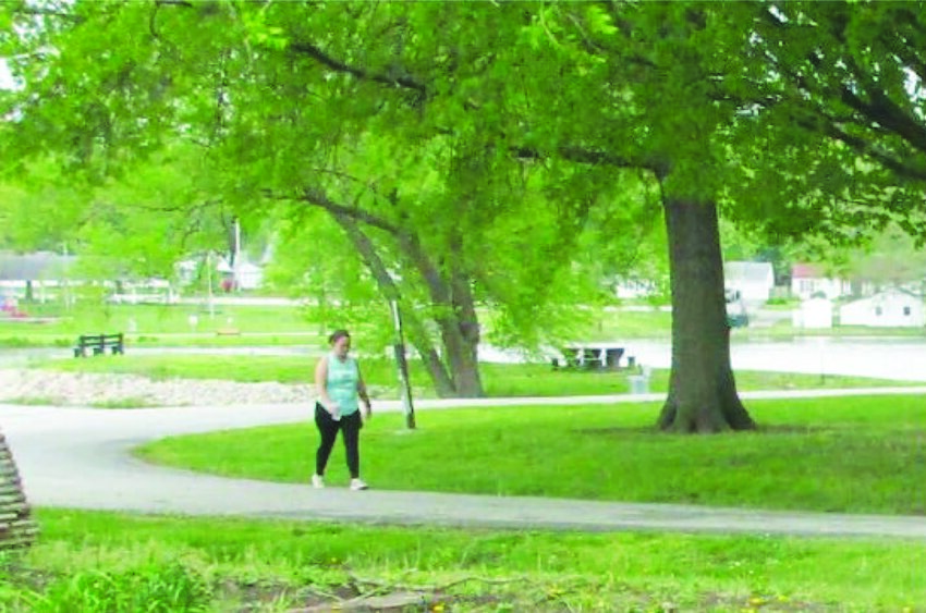 Farrington Park, Windsor, provides a lovely walking area for the 2025 “Miles for Meals” Walkathon sponsored by the Windsor Senior Center, on Sat., April 26, 9 a.m. to 12 noon.  Photo shows Amanda Pettit concluding 5.0 miles in last year’s 2024 Miles for Meals Walkathon.