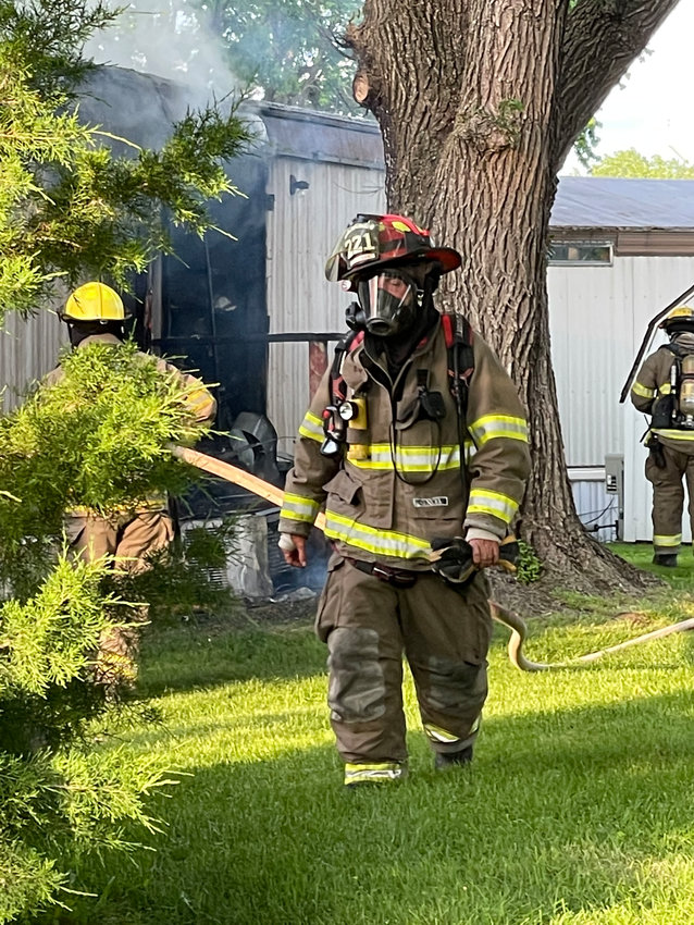Clinton Fireman Mitch Grimes at the fire at the 900 block of North 3rd St. (June 1)