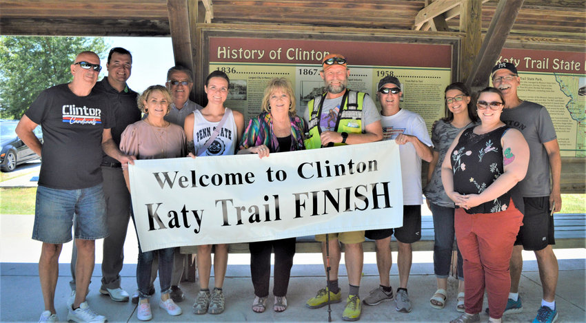 SEVERAL FOLKS from Clinton gathered to welcome Kenny Mintz to town as he arrived in Clinton in late June on his &quot;walk across America&quot;.  Those in attendance included (L to R): Bill Thole, Adam Cummings, Jane Harrison, Gregg Smith, Margaret  Mintz, Mayor Carla Moberly, Kenny Mintz, David Lee, Ashley Whareham, Tina Williams and Tim Komer.