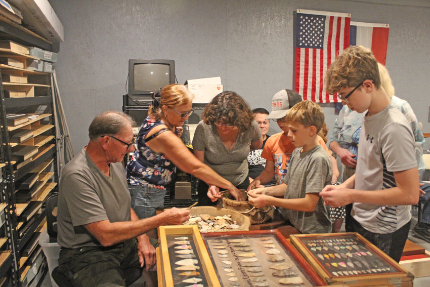 A SHOW FOR ALL AGES, Randy Heany conducted a program on hunting arrowheads in Windsor. Heaney gave away pieces to Marilyn Miller, Melissa Huff, Eldon Brooks, Bennett Golden, Rhason Brooks and Dala Brooks.