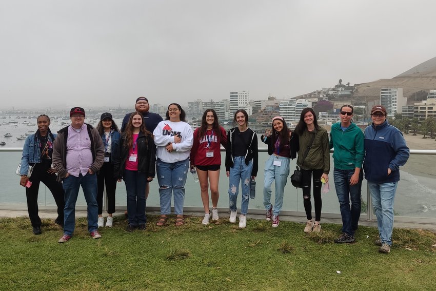 Students and faculty members at the University of Central Missouri who participated in the 2021 Global Vision Endowment service trip to Peru gather for a photo during their experience abroad. They are, from left, UCM students Reagan Holivay, Joe Masters, Yami Crabaugh, Bonnie Ray, Austin Gutmann, Jessica Miller, Natalie Buss, Jessica Fugate, Meilani Cervantes, Alex Swords, faculty member Robynn Kuhlman, Political Science and International Studies, and staff member Anna Ball, International Student Services. (Photo courtesy of Diego Acosta from Global Volunteers)