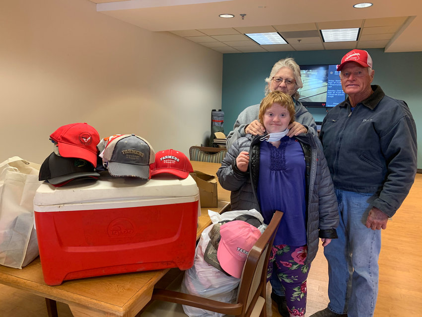 HATS AND BURGERS were delivered to the Veteran&rsquo;s Home in Warrensburg by Sammee, Marylin, and Gene Reid.