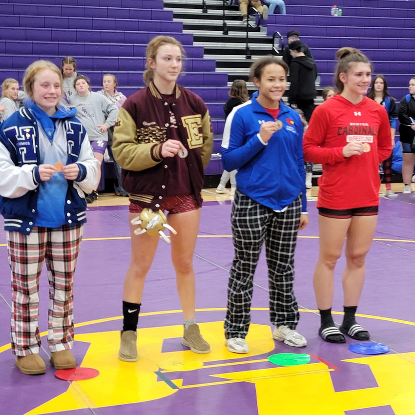 PICKING UP WHERE SHE LEFT OFF, Clinton's Amitria McNack (second from right) took first place at the Steve Leslie Tournament last weekend in Pleasant Hill.  As a team, the Lady Cardinals took sixth place out of 15 entered schools.