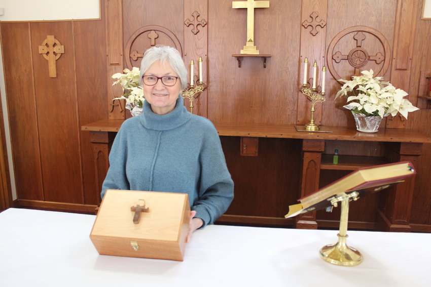 BUILDING BACK BETTER, St. Paul&rsquo;s Bishop&rsquo;s Warden Kate French is proud of the communion box made by her nephew after the former container was damaged in the 2021 flood.