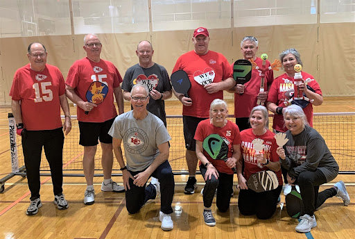 A SECOND PICKLEBALL TOURNAMENT was held at the Clinton Community Center on Friday, Feb. 24. There were 12 teams (24 players). Kathy and Kevin Sullivan won the tournament with Bob Owen and Barry Schmedding coming in second. Several teams tied for third. Back row: Mark Parker, Gene Henry, Bob Owen, Barry Schmedding, and Kevin and Kathy Sullivan. Front row: Tim Komer, Irene Komer, Janet Huskey, and Lynn Schweiger. Not pictured, but also tied for third, Amy Michael and Marlene Martin. Thanks to all that helped and to all that participated. Check out Pickleball Clinton Mo on Facebook for PB information.