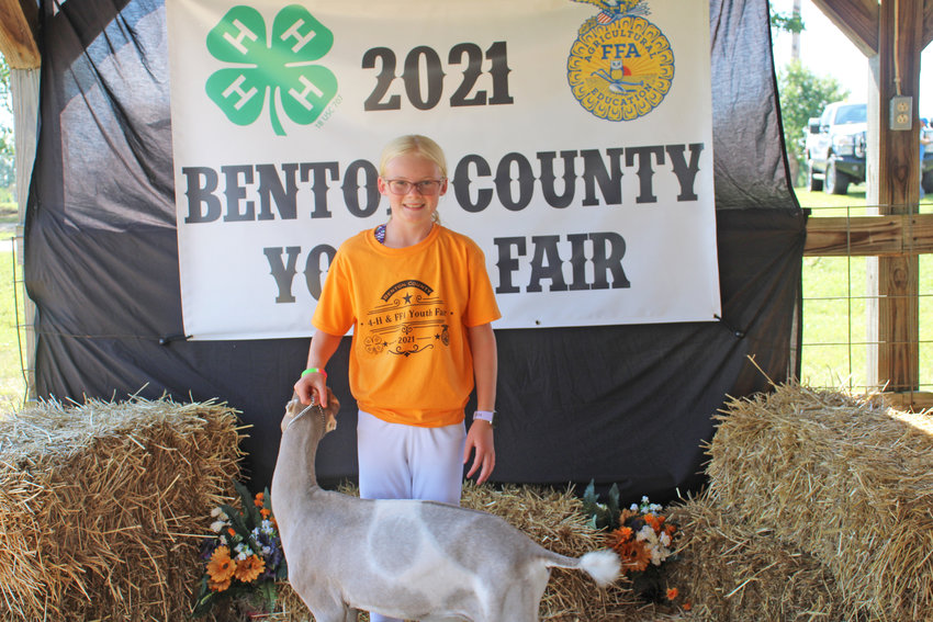 LINCOLN's Molly Strozewski of the Lincoln Cardinal 4-H Club shows off her Blue Ribbon Dairy Wether at the 2021 Benton County 4-H FFA Youth Fair.  This year's fair begins on Thursday, June 23.