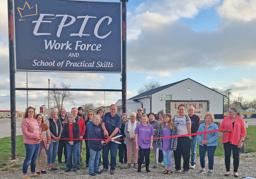 EPIC WORKFORCE and Practical Skills held a ribbon cutting for the recent opening of their location in Lincoln.  Pictured are, Front Row: Lindsey Decker, Chamber President; Amy Biggerstaff, Dorcas Brethower, Cathie Nelson, Wendy and Ron Light, Owners, Kennedy Keithley, Anniston Keithley, Gina Roth, Karen Brown, Jo Ann Lane, Benton County Economic Development. Second Row: Raquel Woronecki, Glen Nelson, Mayor of Lincoln; Jo Lynn Turley, Ranae Watt, Janice Swearingin, Lincoln City Council; Fran Williams, Jack L