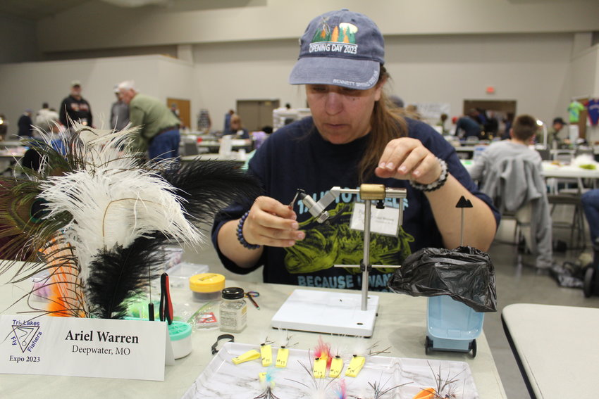 BEGINNERS AND PROS packed a Fly Fishing Expo in Clinton. Attendees included Ariel Warren who has been tying for one year, after taking lessons from her dad, Richard Warren.