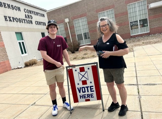 DOING THEIR CIVIC DUTY, Parker Russell and Lori Mothersbaugh voted at the Benson Center on Tuesday.