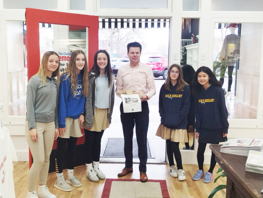Holy Rosary Students stopped by The Clinton Daily Democrat to thank them for sponsoring the Annual Pot O&rsquo; Gold event. Pictured left to right:  Julianna Corn, Hayden Sewell, Kaysen Nold, Democrat Publisher James White, Ellie Club and Paula Haung.