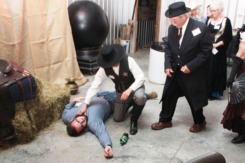 COWBOYS AND COWGIRLS turned out Saturday for an interactive murder mystery dinner at the Calhoun Colt Show Building. Tate Frost, Rob Hill and Joe Trogden were part of the &lsquo;Murder At The Deadwood Saloon&rsquo; cast.