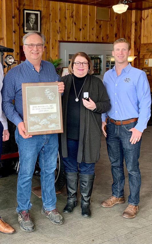 A STORIED PAST, Jeff Cross along with his wife Debbie and son Steven are proud of being part of one of the oldest Ford dealerships in the country, Zink Motor Company. Jeff Cross was recognized with a plaque in 2019 for his 25 years as a Ford dealer.