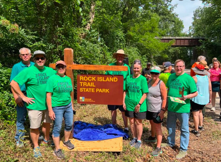 A LOVE FOR THE ROCK ISLAND TRAIL was on display in Windsor during the dedication of Missouri&rsquo;s newest state park. Kim Henderson, third from left and other Friends of the Rock Island Trail State Park attended the event. Henderson was a keynote speaker.