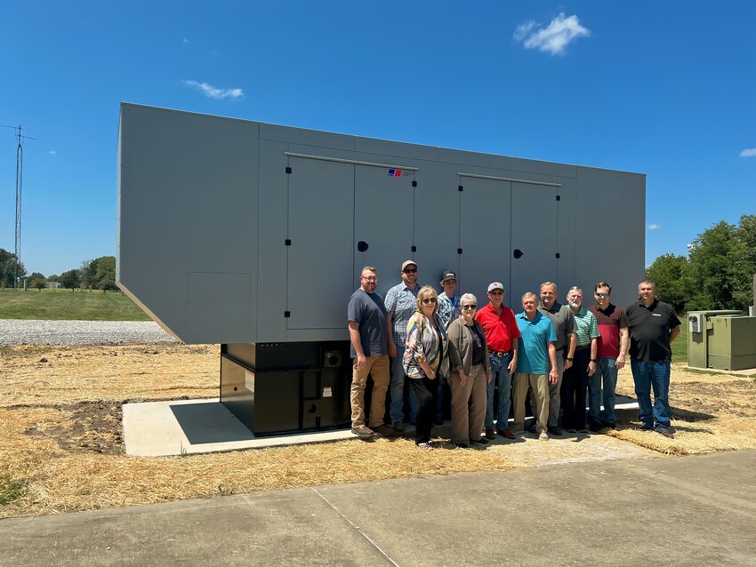 Representatives from the City of Clinton, Henry County Water Company (HCWC) and Alliance Water Resources (AWR) gathered to view the new 500kW emergency back-up generator that was recently installed at the HCWC treatment plant.