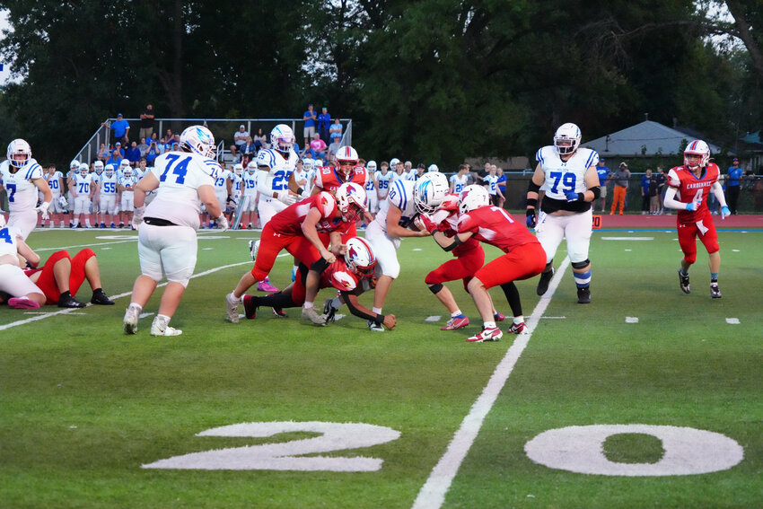 THE CARDINALS DEFENSE came through in a big way in Clinton's 21-7 home win over Holden last Friday night.  The Cards will travel to Pleasant Hill this week to take on the Roosters.