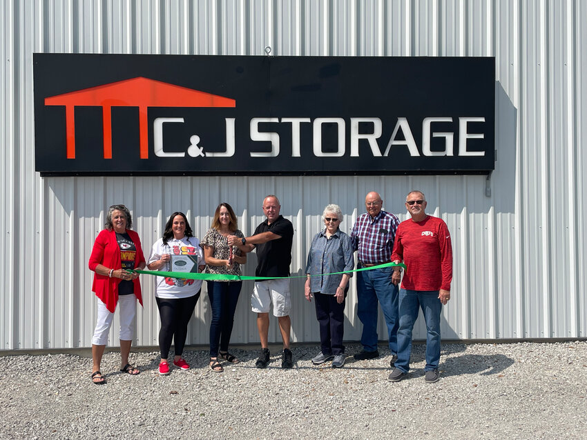 BENTON COUNTY ECONOMIC DEVELOPMENT and the Warsaw Chamber held a joint ribbon cutting for C&amp;J Storage to celebrate their 68 Climate Controlled Units. Pictured (L to R): Jo Ann Lane, Benton County Economic Development Director; Whitney Day, President, Warsaw Chamber Board; Tammy Bownds, owner; Norm Bownds, owner; Janie Bownds, Charles Bownds and Rick Limback.