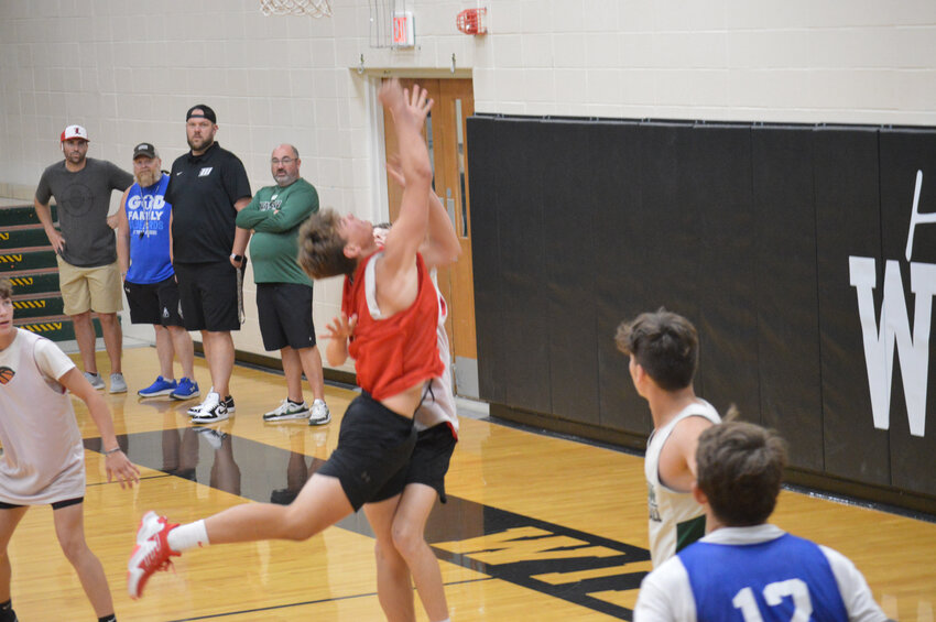 IN FRONT OF COACHES Tyler Burke (Lincoln), Kevin Shearer (Cole Camp) Dennis Larson (Warsaw) and Matt Brownsberger (Warsaw), local boys players have had the chance to compete with and against teammates from the same and different schools.
