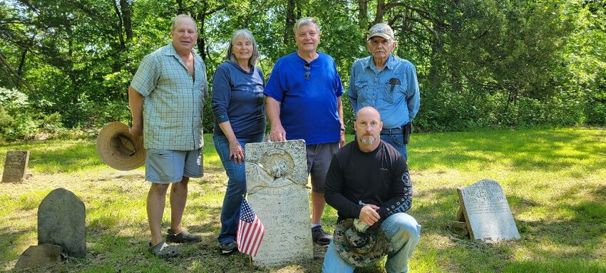 HONORING their ancestors, Dennis Kopp, Lila Shull, John Ferguson and Harold Shull  along with local historian Jeff Polly helped clean up Mount Herman Cemetery in southern Benton County.