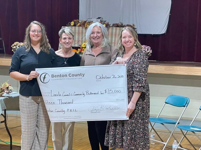 A DREAM COME TRUE for the Benton County Community Foundation, the first grants for the PHIL Society were announced during a reception held at the Warsaw Community Building. Lindsey Decker accepted a check on behalf of Lincoln Council For Community Betterment from PHIL officials Suzie Brodersen, Dorcas Brethower and Ashley Silva.