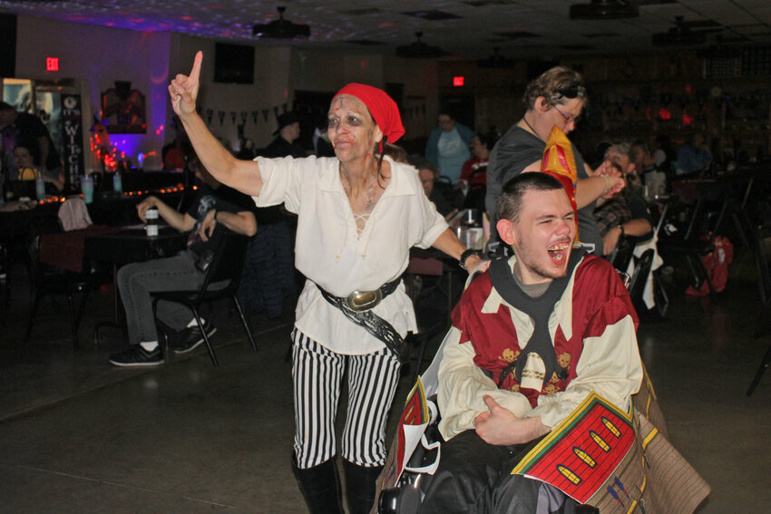 A NIGHT TO SHINE, CHS representative Leslie Brown and Gabe Adams attended an Adults With Disabilities dance at the Warsaw Shrine Club on Saturday night.
