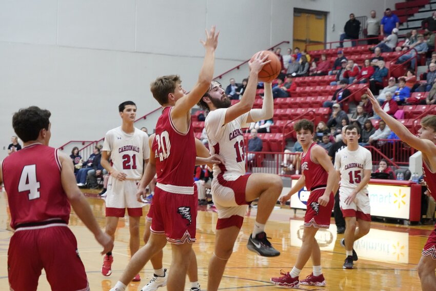 SPURRING THE OFFENSE, Clinton's Garrett Ethridge went on a tear in the second half of last Tuesday's remarkable win over Archie.  Ethridge finished with 12 points in the contest.