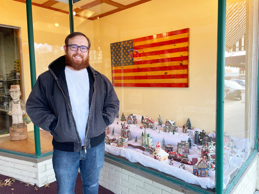 A CLASSIC CHRISTMAS VILLAGE is a highlight of the season at Creative Paints where proprietor Keith Weston adds pieces each year.