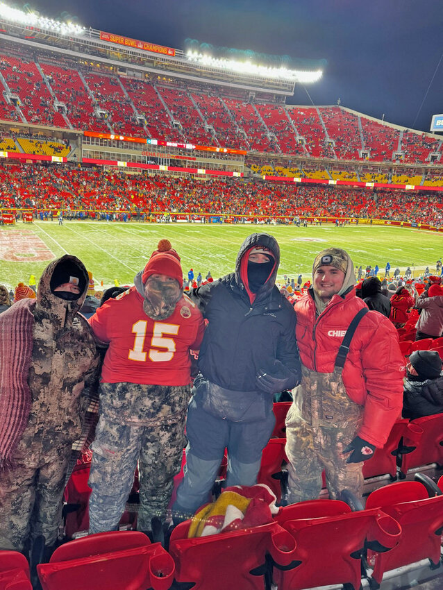 MAKING MEMORIES in the frozen air at Arrowhead on Saturday night, Nick Bagley, Gage Whitaker, Brady Slavens and Ben Markham helped cheer the Chiefs to an AFC Wild Card win over the Miami Dolphins.