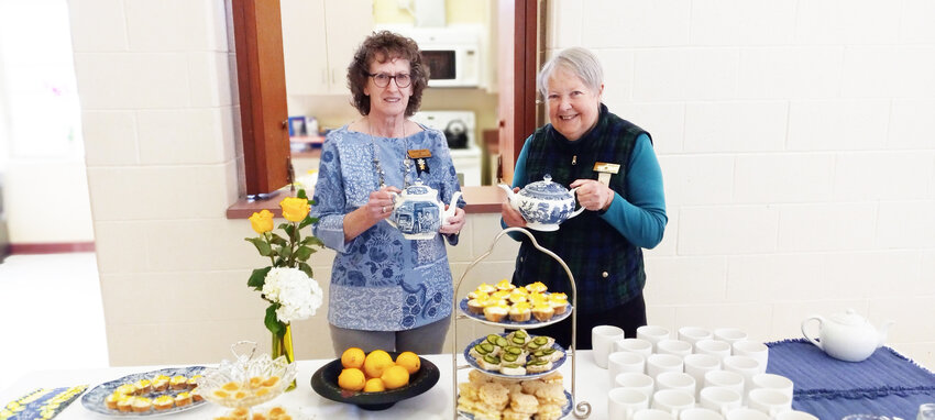 Hostesses Connie Grisier, left,  and Jennifer Jackson served a lemon tea at the Feb. 8 meeting of Chapter EN.
