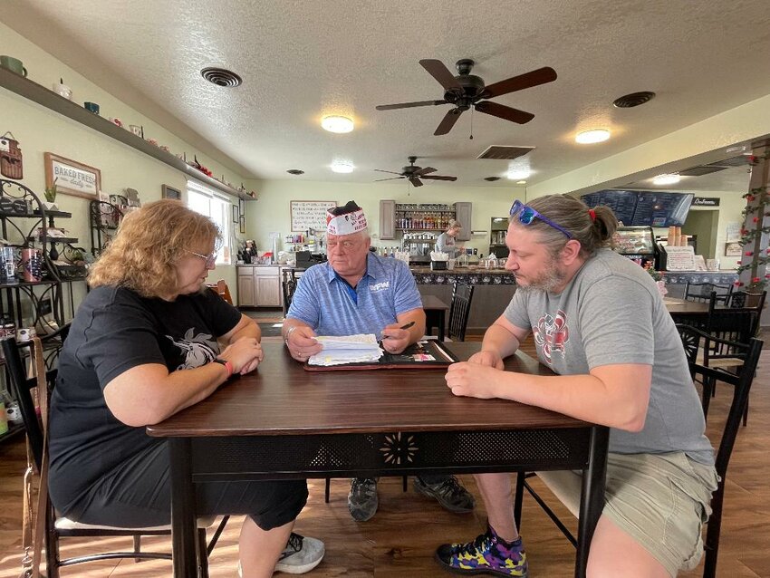 GETTING THE WORD OUT, VFW Past State Commander Royce Kelb met with Susan Kelb and Seth Coon regarding exorbitant fees that  some Veterans have been subject to when filing disability.