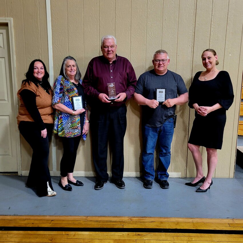 A NIGHT TO REMEMBER, Warsaw Area Chamber of Commerce President Whitney Day, along with Megan Petersen presented the Community Partner Award to Jo Ann Lane, Lifetime Achievement Award to Chuck Allcorn and Top Sponsor Award to Charlie McGann last Tuesday.