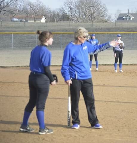 IN A TIME OF NEED, Terri Ward gives instructions to her players during practice last week. Coach Ward has returned to help Darian Rusk coach the Lady Bluebirds this season.
