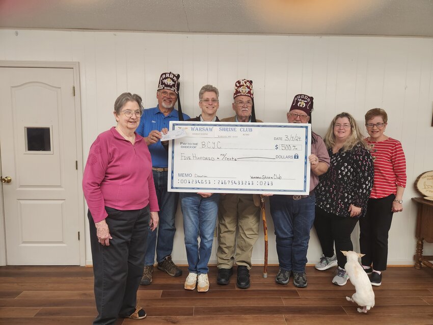 THE WARSAW SHRINE CLUB donated $500 to the Benton County Youth Coalition to help purchase bikes for their upcoming Easter Egg hunt. The event will be at West Bledsoe Ferry Sports Complex on Saturday, March 30, beginning at 2:00 PM. Pictured (L to R): Anita Colley BCYC; Steve Elliott, Warsaw Shrine Club; Loren Whetsell, BCYC; Merv Terill, Warsaw Shrine Club; John Mackey, Warsaw Shrine Club; Amie Breshears, BCYC; and Cynthia Bolinger, BCYC.