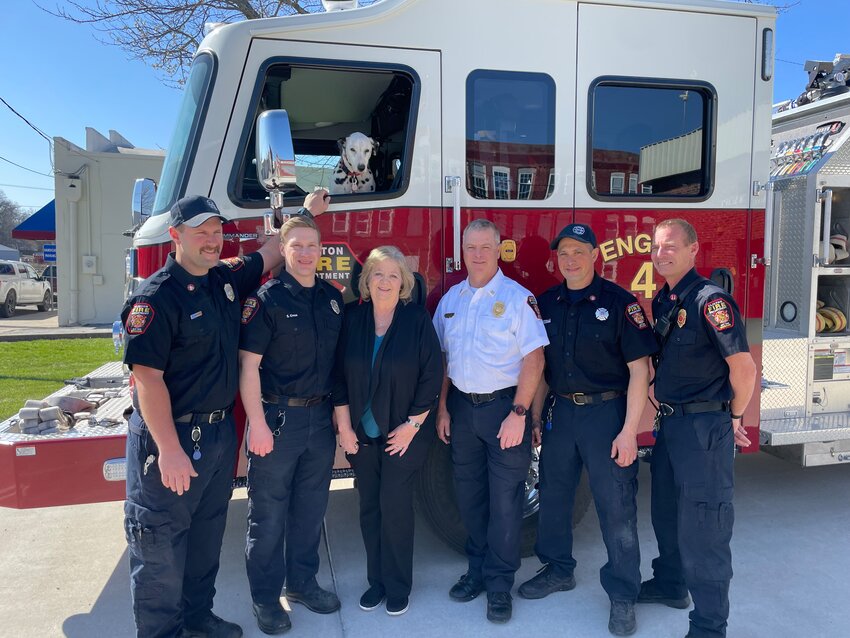 SHOWING THEIR SUPPORT for a Public Safety Tax, Firefighter Matt Kramm, Steven Cross, Mayor Carla Moberly, Chief Mark Manuel, Firefighter Danny Bailey and Firefighter Chris Reno urge citizens to attend an informational meeting on March 26 at the Benson Center.