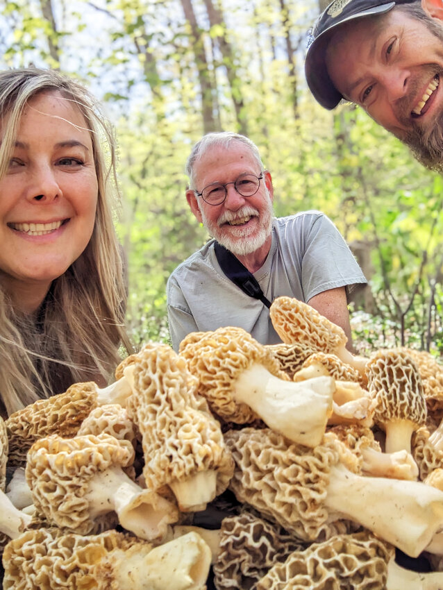 A RIGHT OF SPRING, Cara Snyder along with Bo Brown and Mike Snyder display a fine collection of morels.