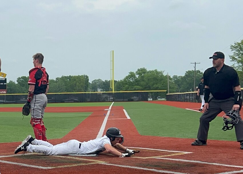 COMIN' IN HOT, Warsaw's Garrett Ferguson rounded all the bases and scored on an inside-the-park grand slam homerun in the Wildcats 18-0 win over Eldorado Springs in the third place game of the OHC Tournament on Saturday.