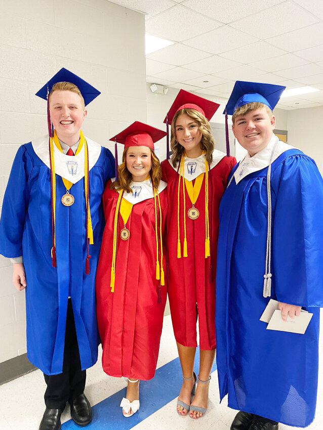 TOPPING OFf THEIR HIGH SCHOOL YEARS, CHS seniors Nathan Lankford, Kaydith Maddox, Ava Potter and Landon Corson prepared to receive their diplomas during CHS&rsquo;s graduation ceremony.