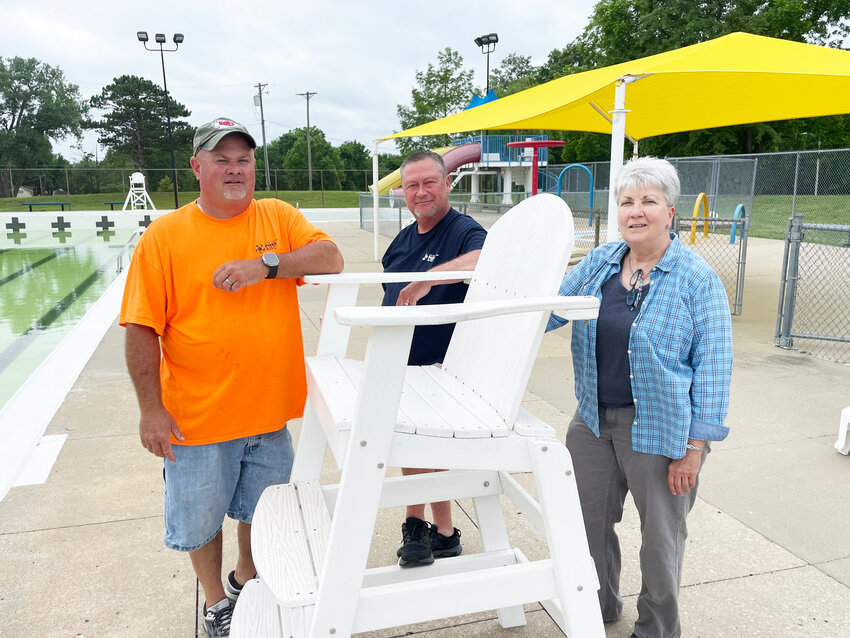 FINAL PREPARATIONS are being made at Artesian Park Pool before operations begin. City employees John McClendon, Brad Combs and Christy Maggi inspected repairs being made at the facility on Tuesday.