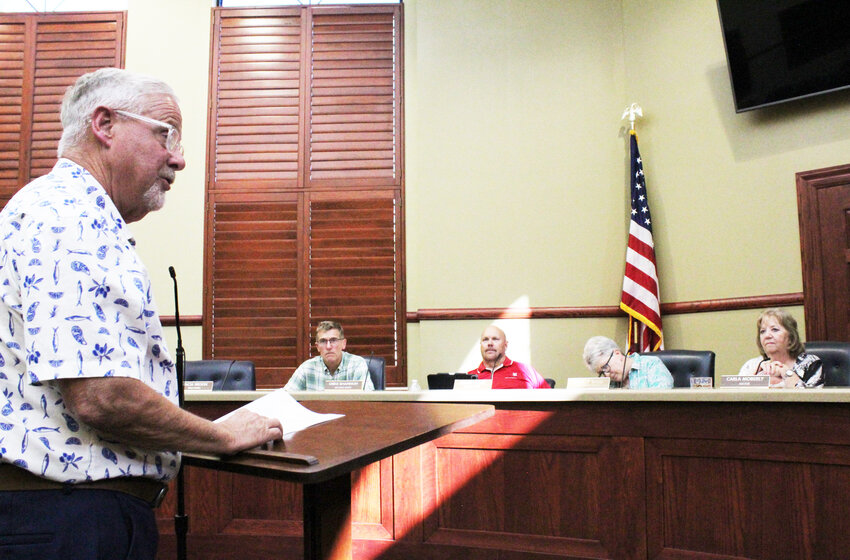 Economic Development Director Mark Dawson speaks to city council about available power on July 2 at the municipal building in Clinton. Looking on are 2nd Ward Councilman Greg Shannon, 2nd Ward Councilman Roger House, City Administrator Christy Maggi and Mayor Carla Moberly.