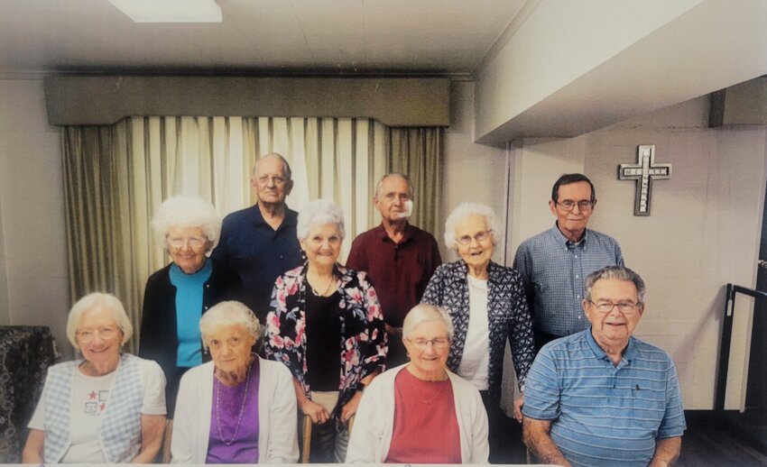 THE GRADUATING CLASS OF 1957 met at the Warsaw Methodist Church for their 67th reunion, with 10 class members and 4 spouses attending. Scott Gemes, R-IX Superintendent, was the guest speaker and enlightened the group on improvements of the entire district. Gemes is a third generation graduate of Warsaw High School. Those in attendance at the reunion included, front row: Ann Breshears, Doylene McLerran, Leota Kreisel, Rick Fajen; middle row: Louise Drake, Carolyn Fajen, Roberta Heidrick, Turner Shipman; back row: Lowell Moore, Jim Drake.