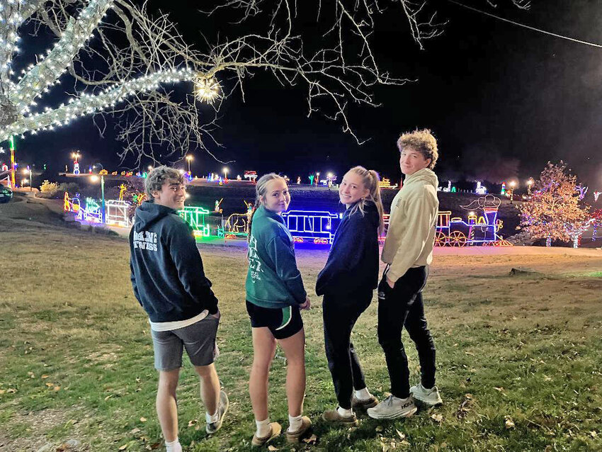 MAIN STREET AND DRAKE HARBOR are home to a magnificent display of Christmas lights. Shane Poyser, Keira Mostaffa, Mady Reimund and Luke Henderson enjoyed the scene on Monday evening.
