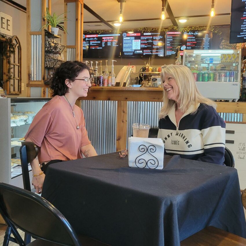 OUT AND ABOUT, newly appointed Warsaw Area Chamber of Commerce Executive Director Dee Dee Hunter has been meeting with members including Alex Young at Redwing Coffee &amp; Sweet Treats.